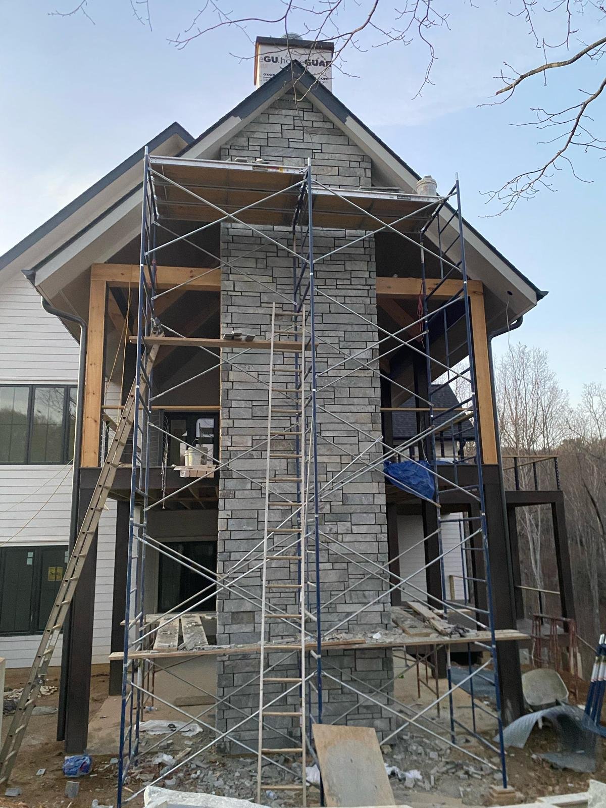 Structural Stone Retaining Wall #41 completed by New Style Masonry LLC in Waynesville, NC