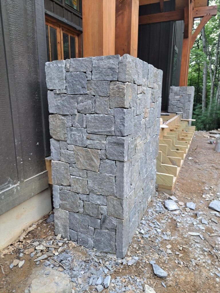 Structural Stone Retaining Wall #10 completed by New Style Masonry LLC in Candler, NC